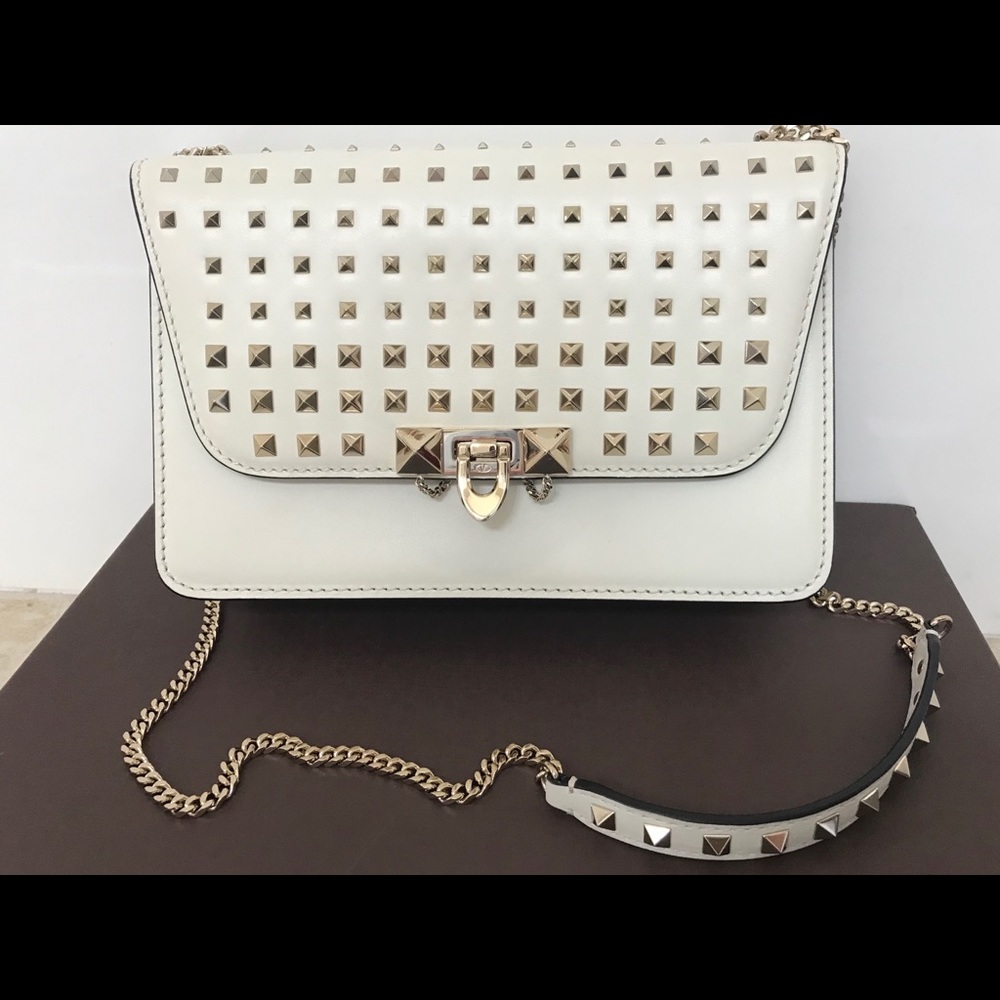 White spike studded Valentino flap bag